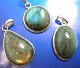 Sterling silver pendant with assorted geometrical design labodorite seashell inlaid,  around edge, assorted design randomly pick