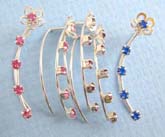 925.cz sterling silver earring with silver layout a flower figure and assorted color design
