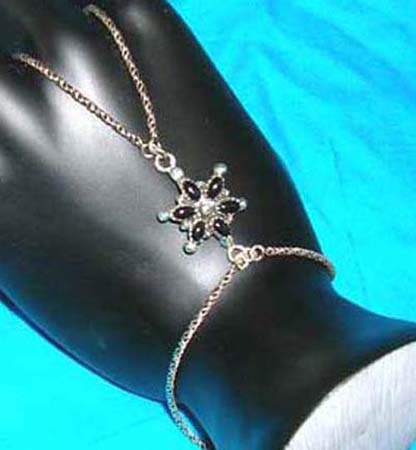  925.sterling silver slave bracelet with black fau* stone and marcasite stone design